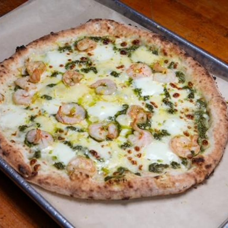 Savor our pesto pizza